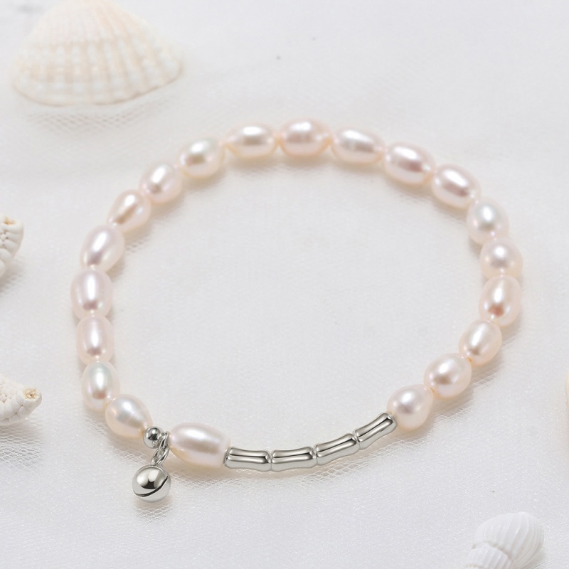 Гривна 5-7мм. бели перли и сребърни елементи, ластик, 18см