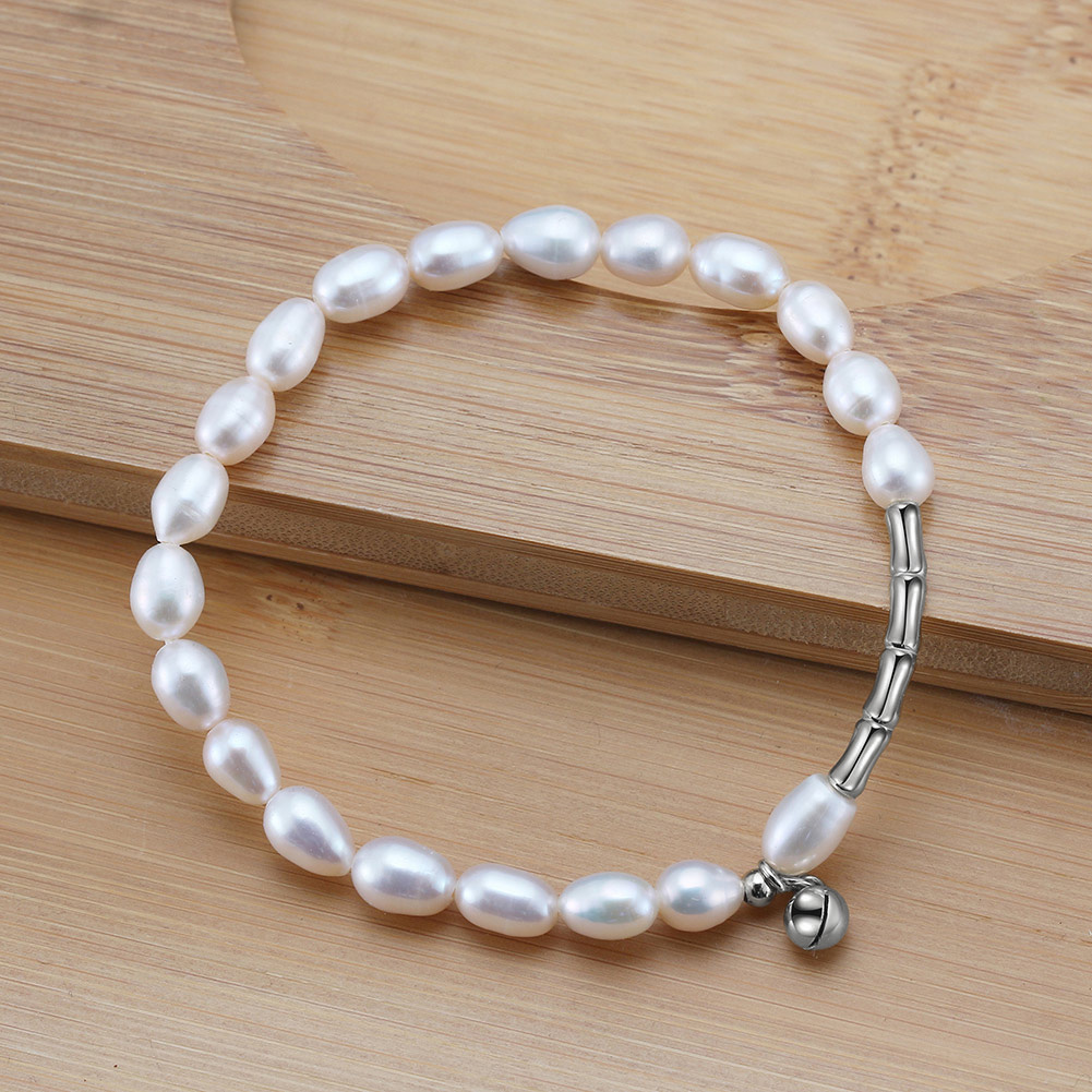 Гривна 5-7мм. бели перли и сребърни елементи, ластик, 18см